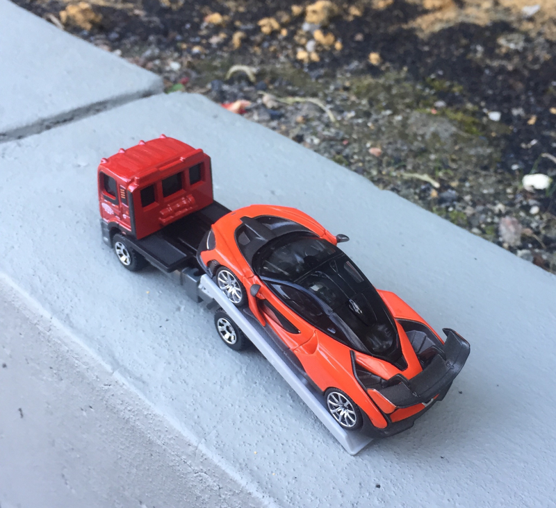 Illustration for article titled McLaren Monday - Mira Orange delivery with Matchbox Flatbed King!